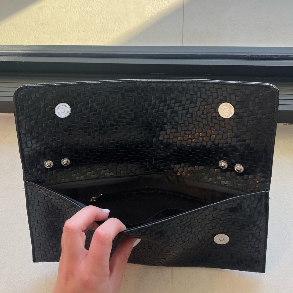 Black woven clutch